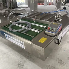 自动化酱菜真空包装机图片
